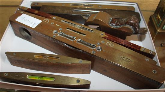 Collection of 7 brass & 1 other spirit levels & a plane